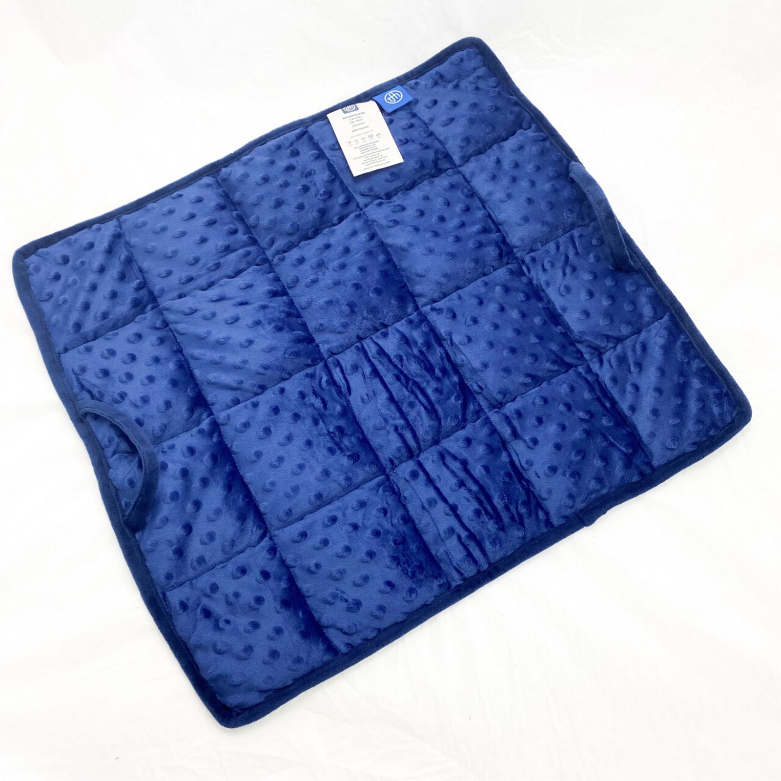 Weighted Pad, soft textured square lap or shoulder pad.