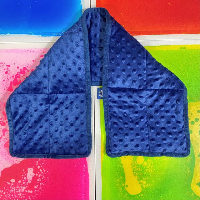 Weighted Pad, soft textured square lap or shoulder pad.